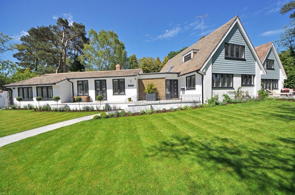 Classic colonial house with traditional exterior and pitched roof